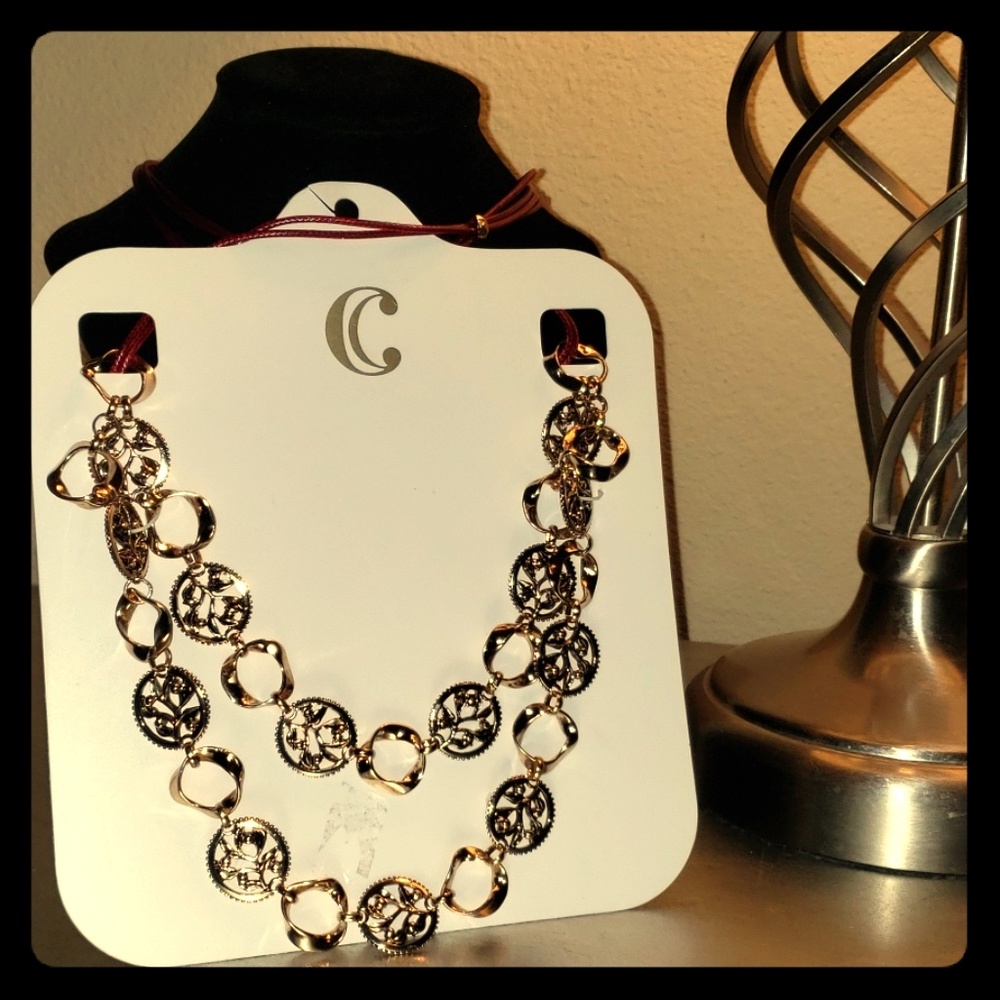 Wine leather corded gold neck. Charming charlies